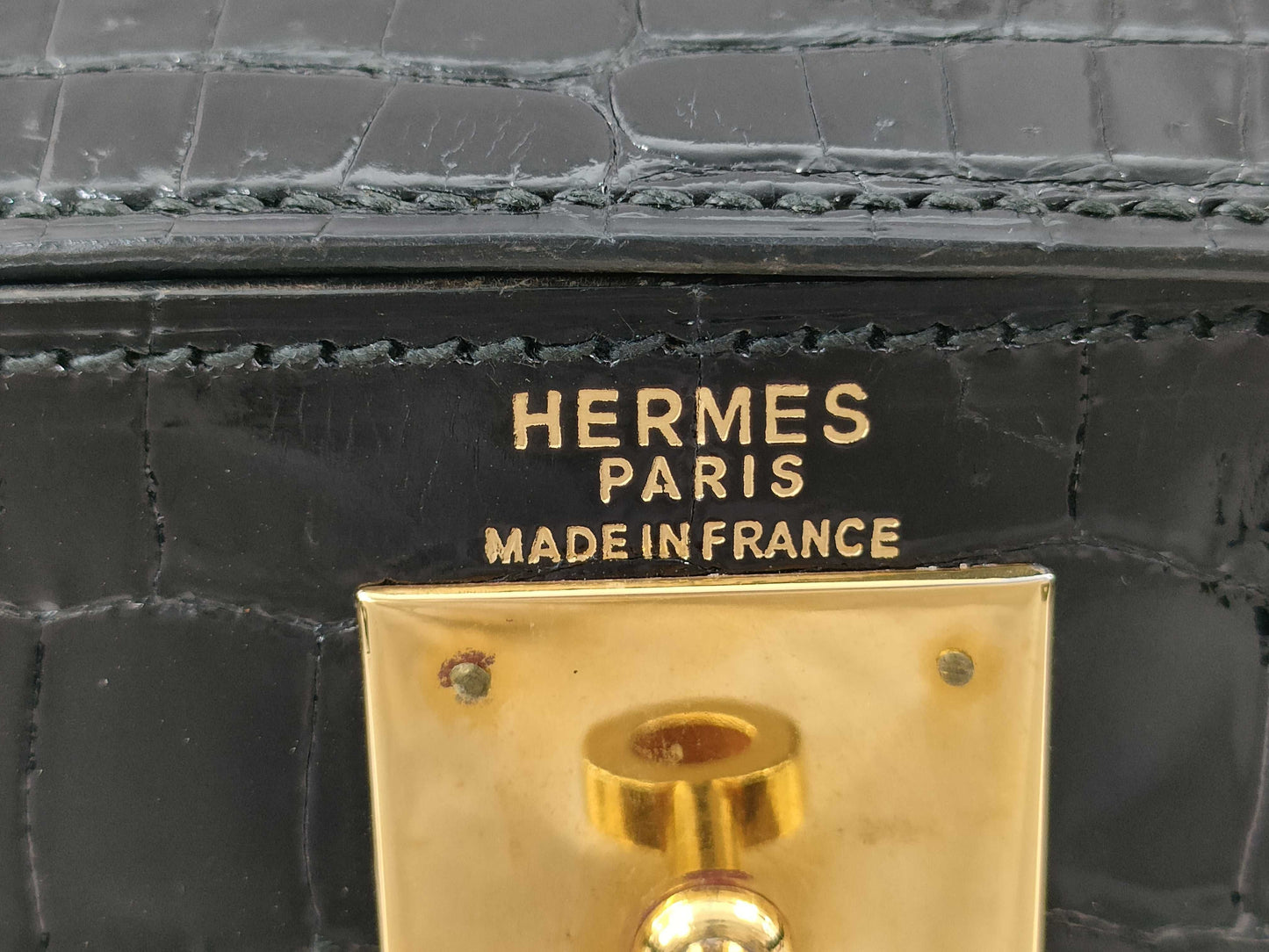 HERMES Kelly 28 Black Handbag with Gold Hardware and G Stamp