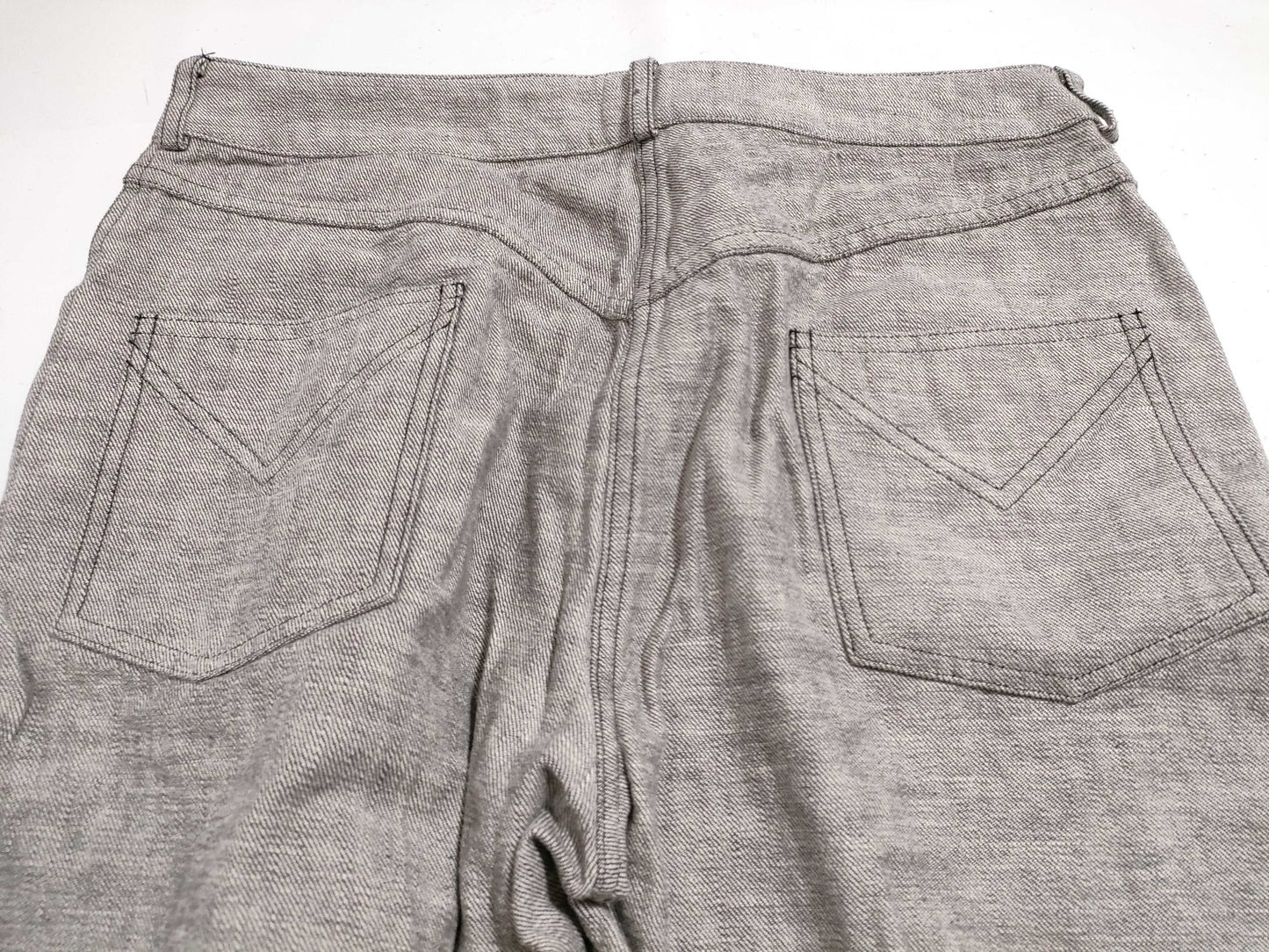 Christian Dior Galliano-era denim pants with D logo hardware