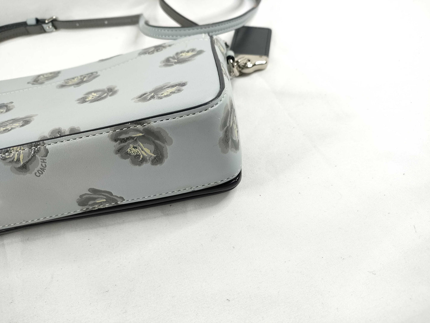 COACH shoulder bag in light blue calf leather with floral print