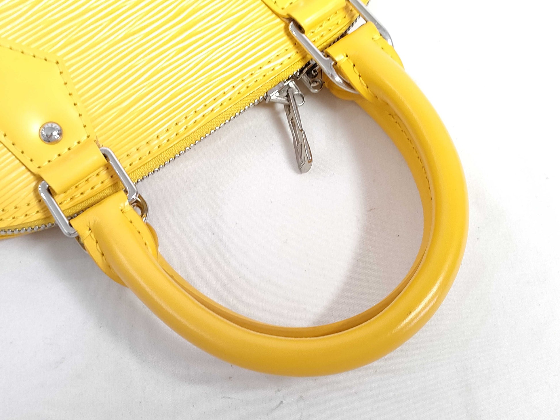LOUIS VUITTON Alma BB Yellow Handbag
