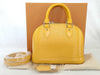 LOUIS VUITTON Alma BB Yellow Handbag