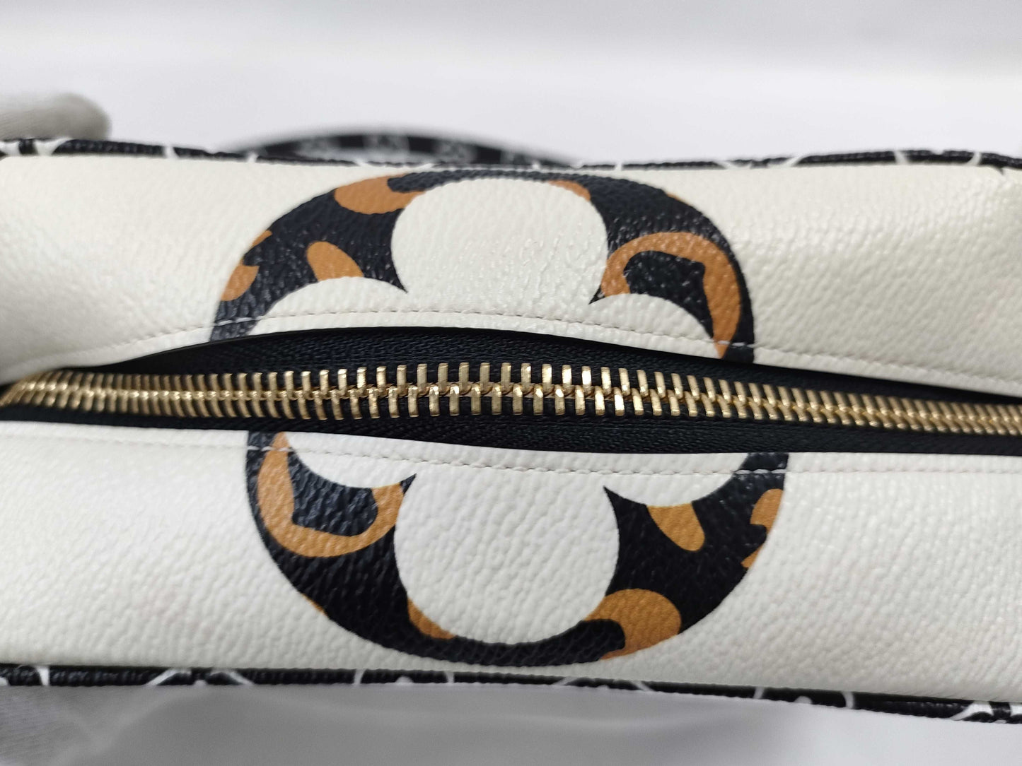 LOUIS VUITTON Jungle Beach Pouch Shoulder Bag in White with Multicolored and Gold Hardware, Monogram Canvas, M67883 TR2129 Shoulder Bag
