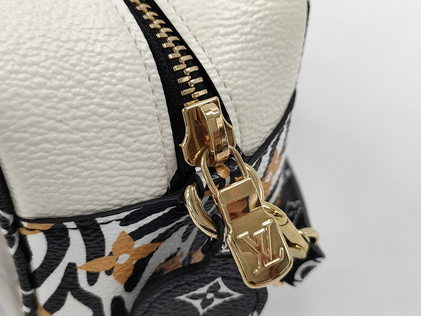 LOUIS VUITTON Jungle Beach Pouch Shoulder Bag in White with Multicolored and Gold Hardware, Monogram Canvas, M67883 TR2129 Shoulder Bag