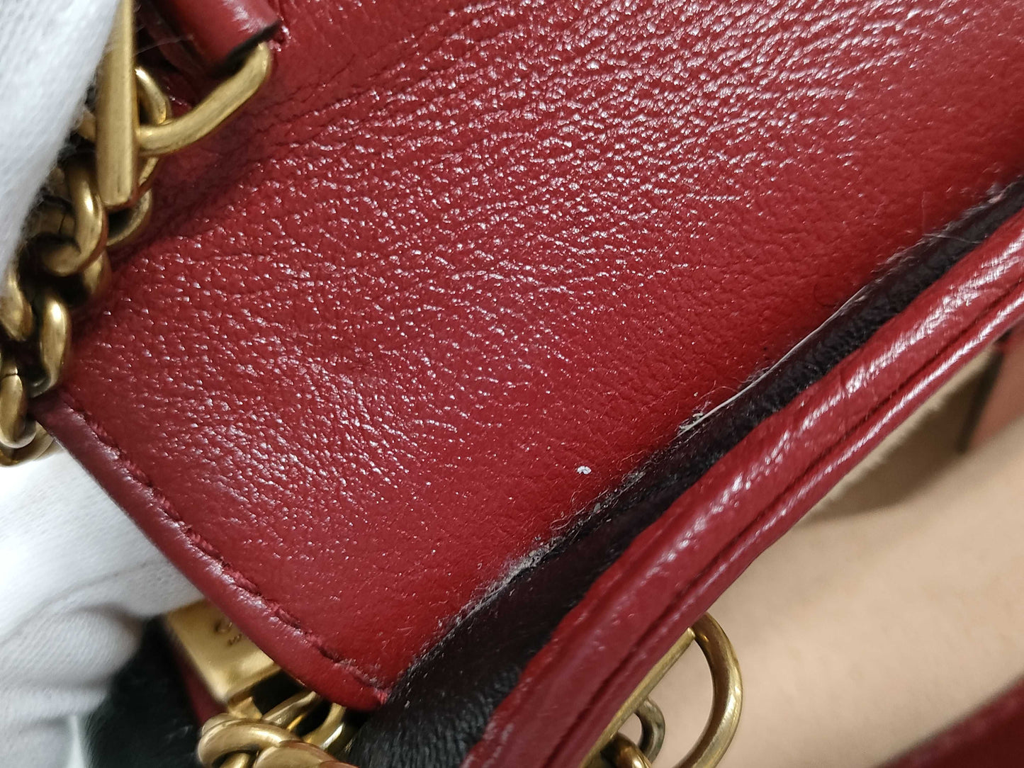 GUCCI Super Mini GG Marmont Matelasse Leather Shoulder Bag in Black, Red, and Gold Hardware with Chain Shoulder Strap