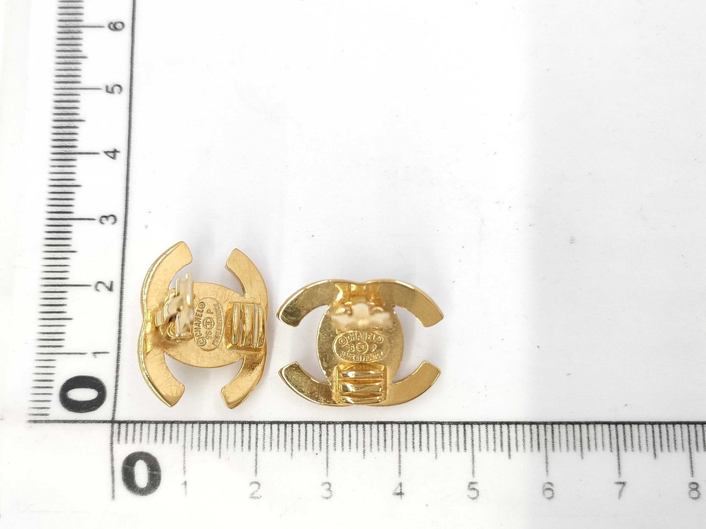 CHANEL Turnlock Earrings