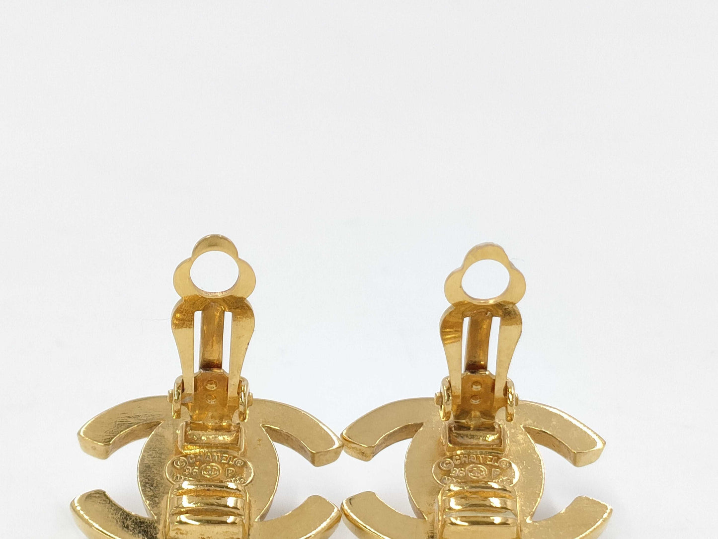 CHANEL Turnlock Earrings