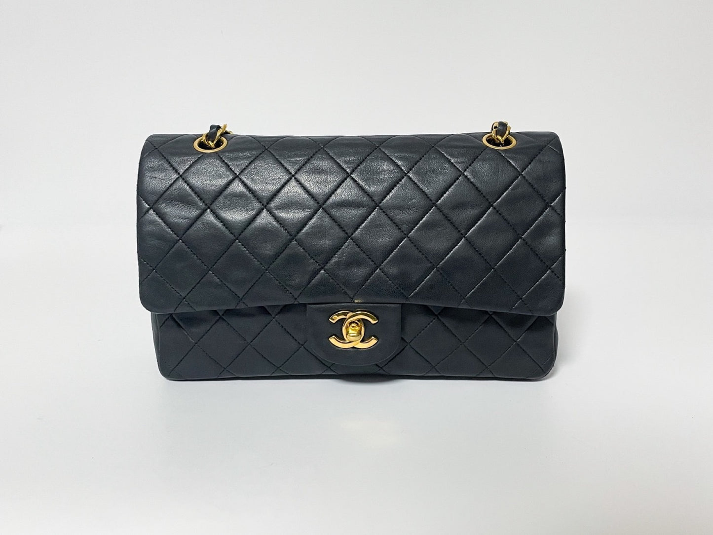 CHANEL Double Flap Matelasse Black Lambskin Shoulder Bag with Seal