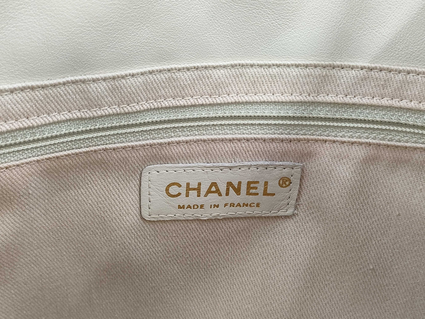 CHANEL Camellia Lambskin Tote Bag in White with CHANEL Logo Sticker