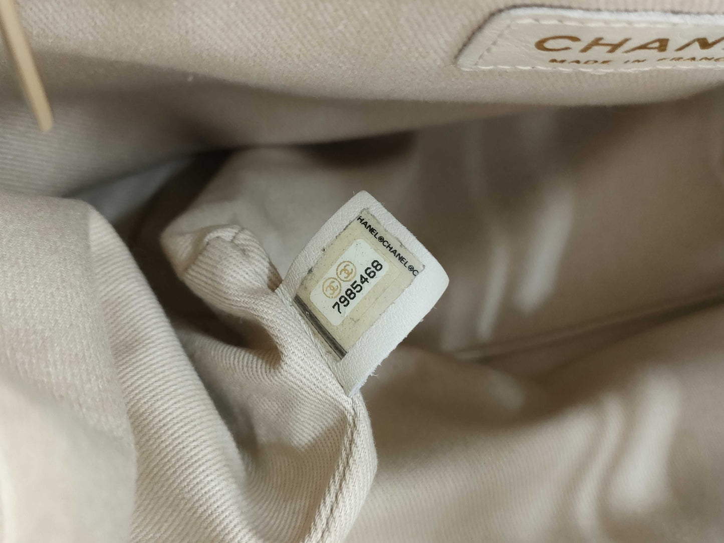 CHANEL Camellia Lambskin Tote Bag in White with CHANEL Logo Sticker