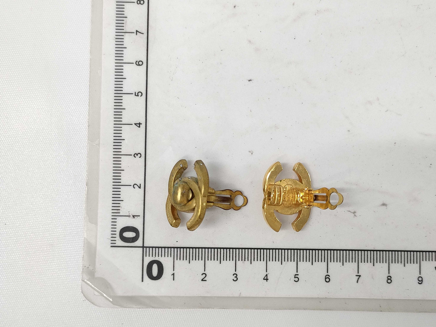 CHANEL Turn Lock Earrings