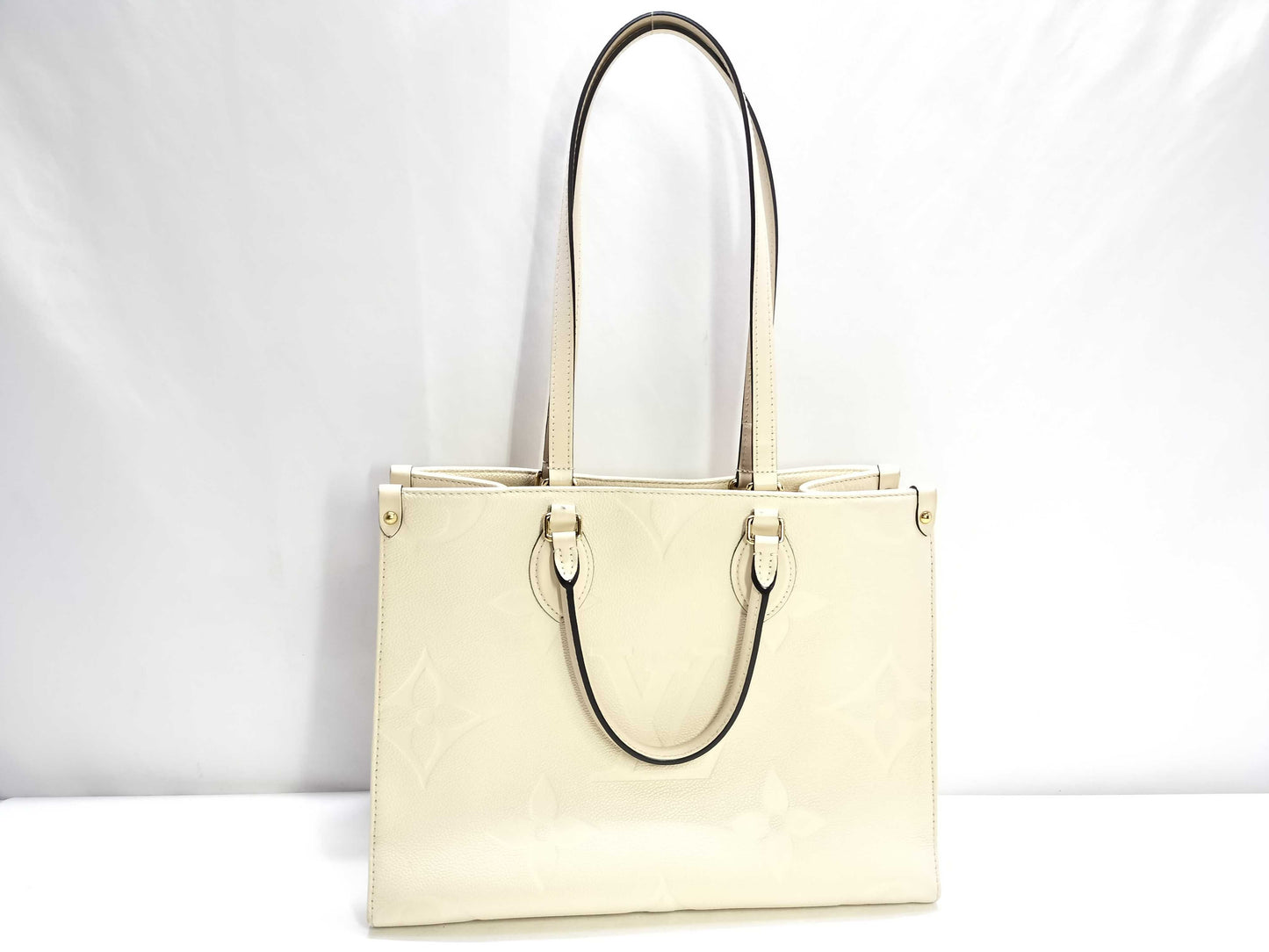LOUIS VUITTON Monogram Empreinte Louis Vuitton On the Go MM Tote Bag
