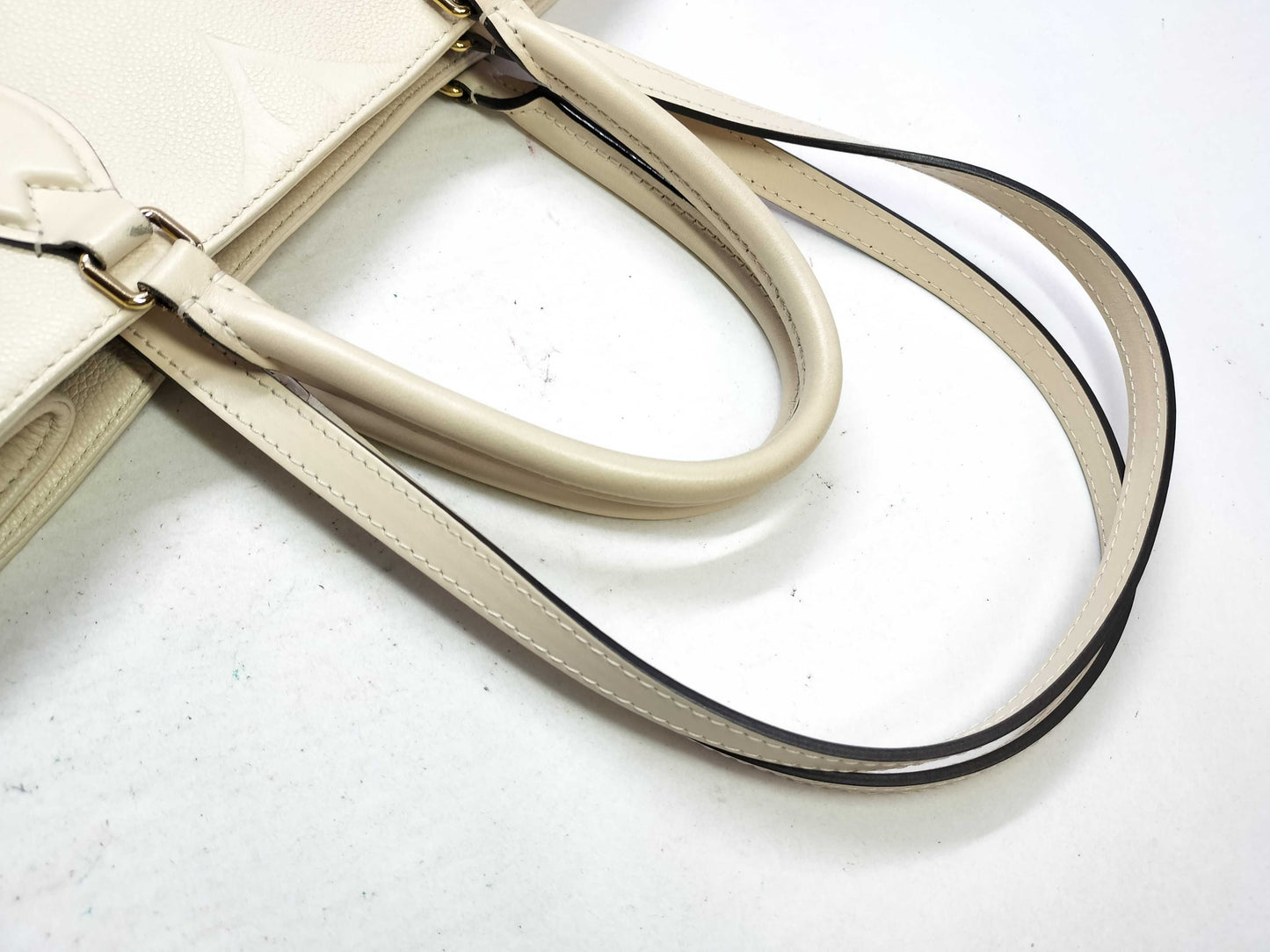 LOUIS VUITTON Monogram Empreinte Louis Vuitton On the Go MM Tote Bag