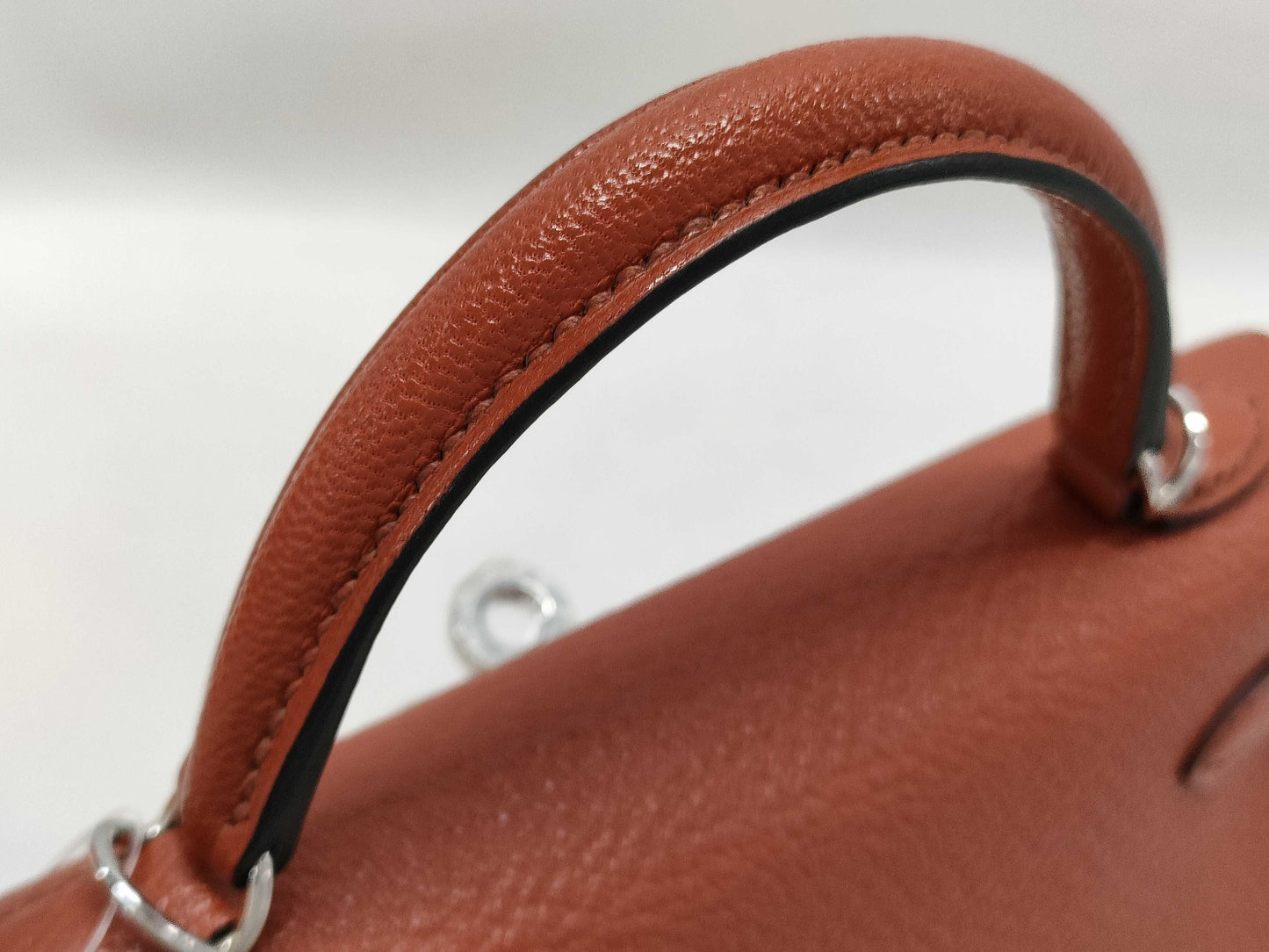 HERMES Kelly Mini II Cuivre Shoulder Bag with P hardware, Chevre U stamp, and protective seal