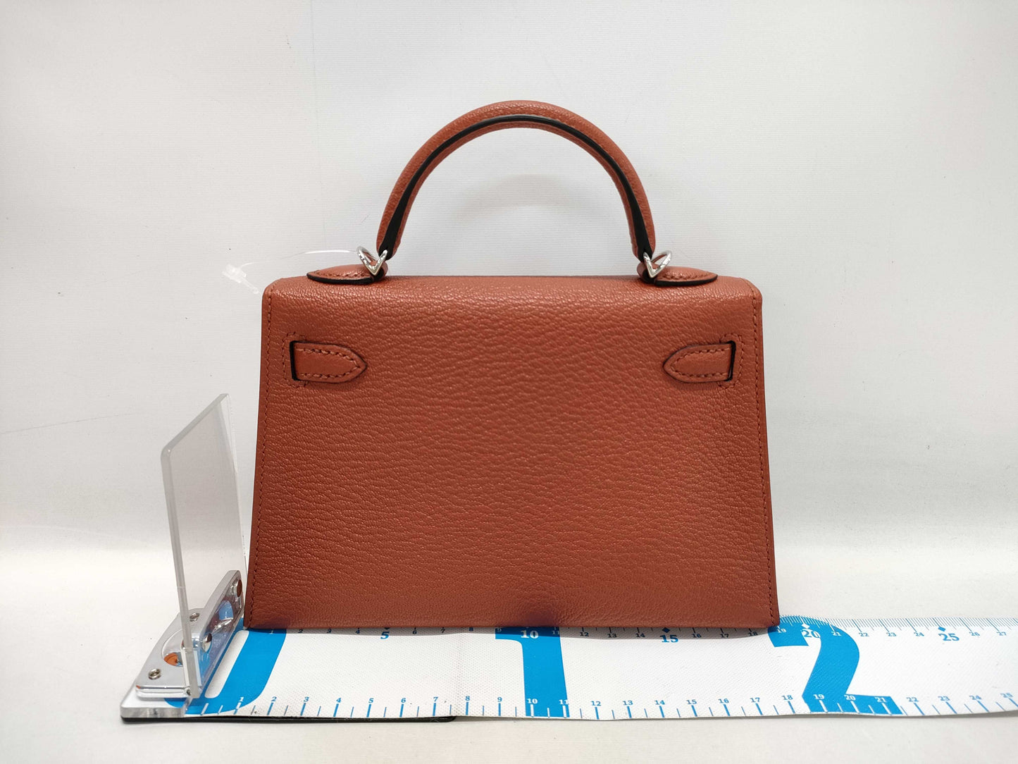 HERMES Kelly Mini II Cuivre Shoulder Bag with P hardware, Chevre U stamp, and protective seal