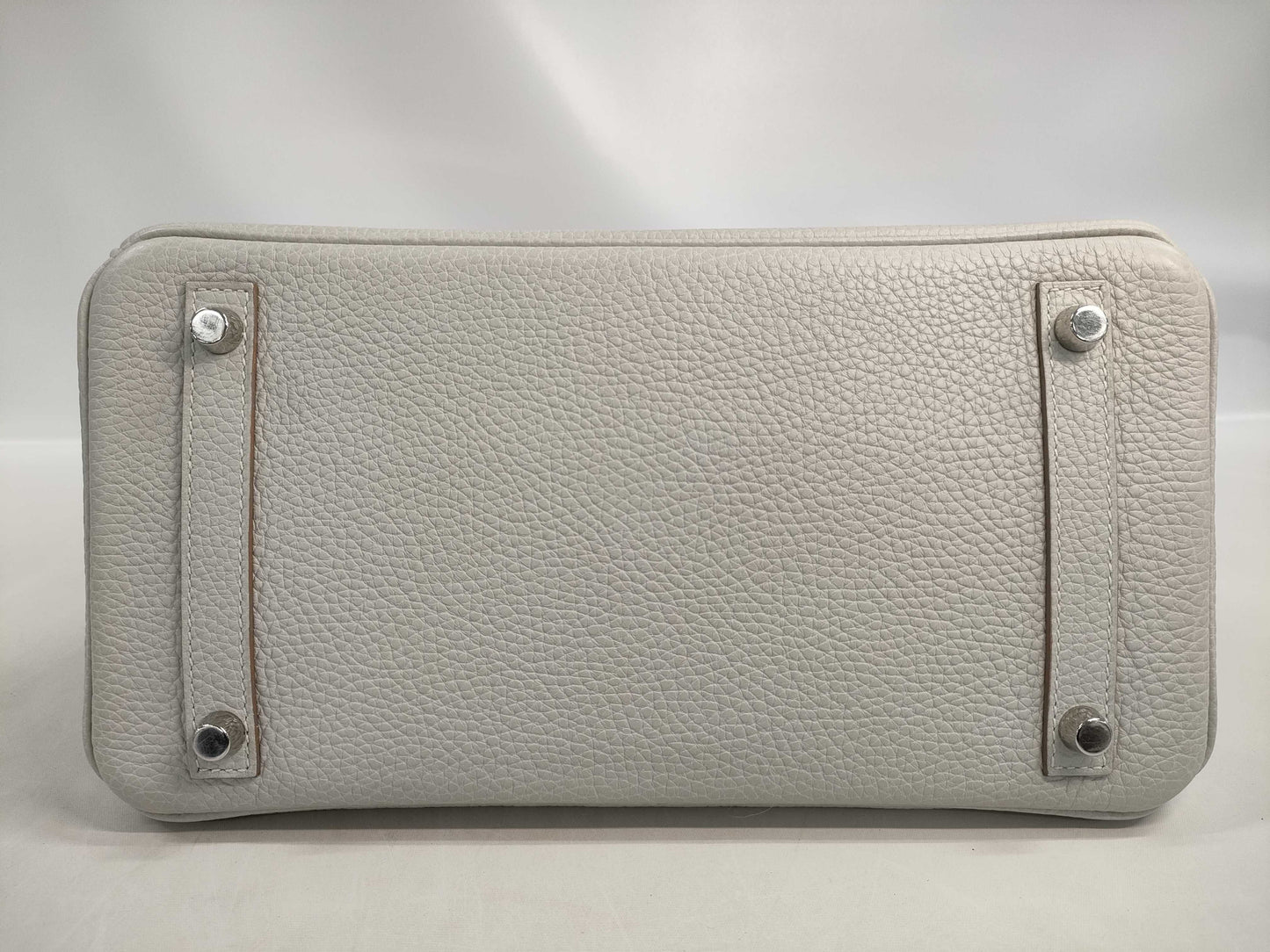 HERMES Birkin 30 handbag in ivory with silver hardware and a C stamp.