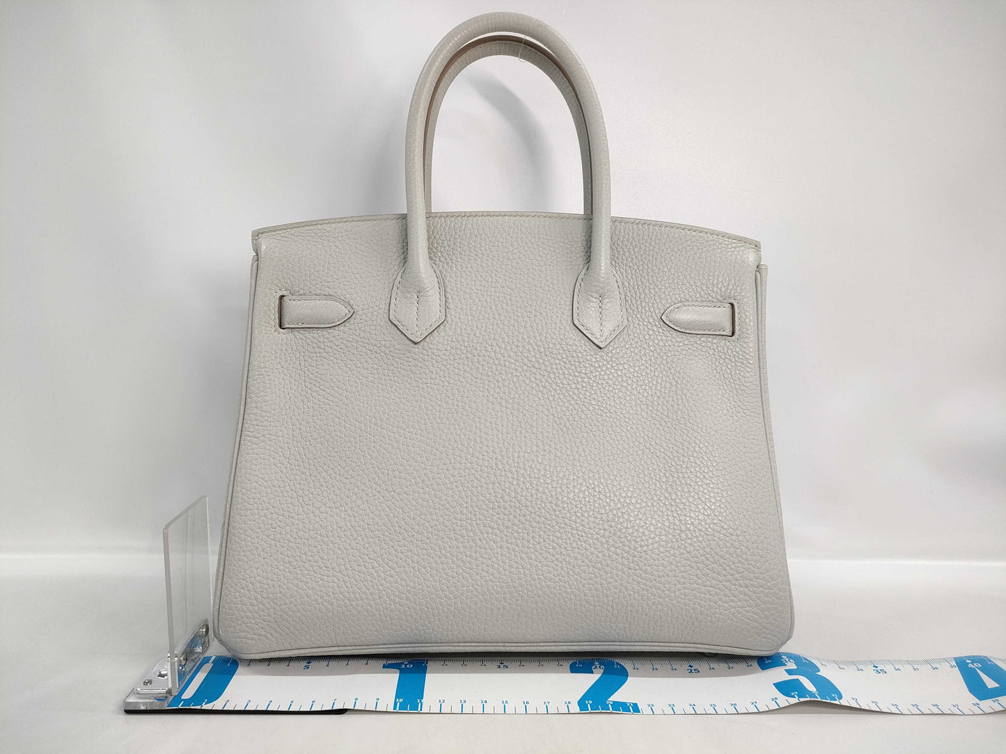 HERMES Birkin 30 handbag in ivory with silver hardware and a C stamp.
