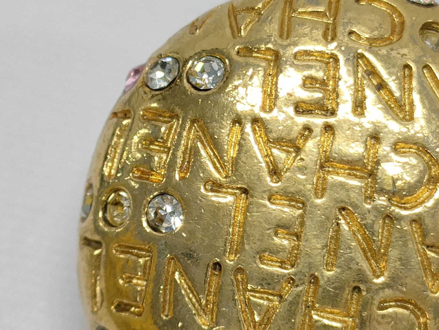 CHANEL logo rhinestone earrings