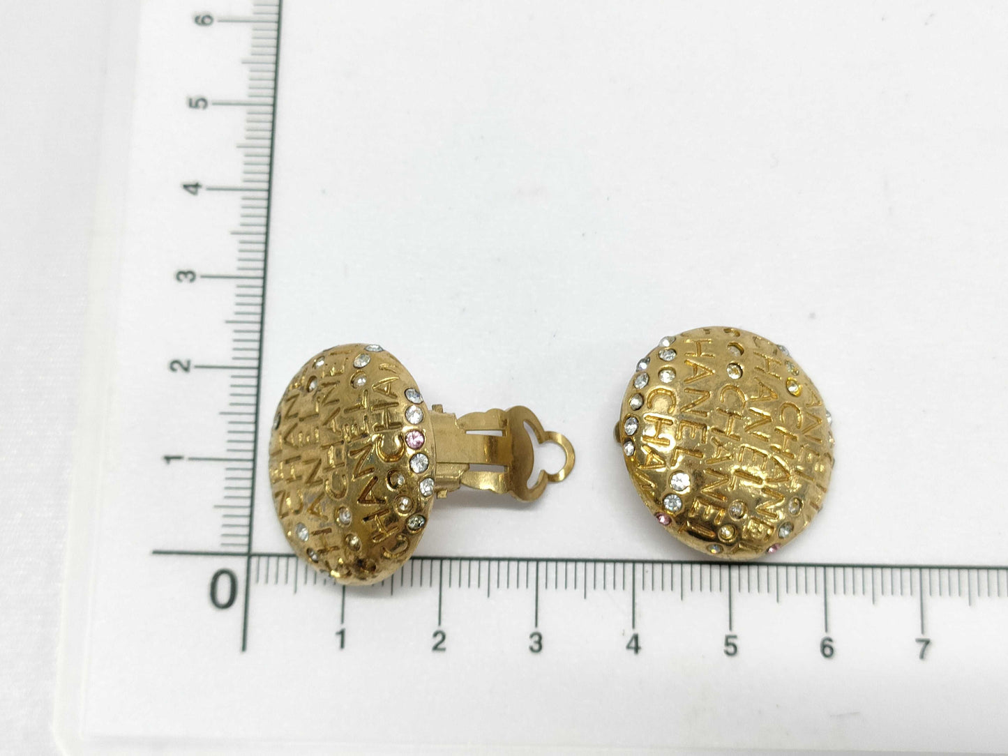 CHANEL logo rhinestone earrings
