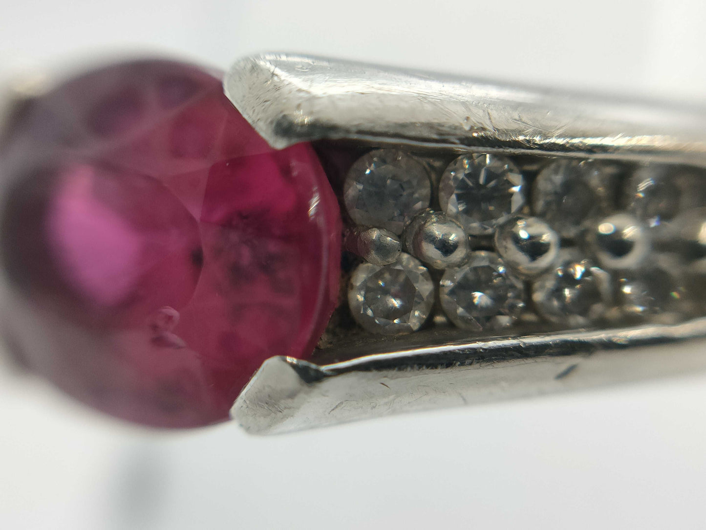 2.22ct colored stone, 0.23ct diameter, PT900, 8.9g ring