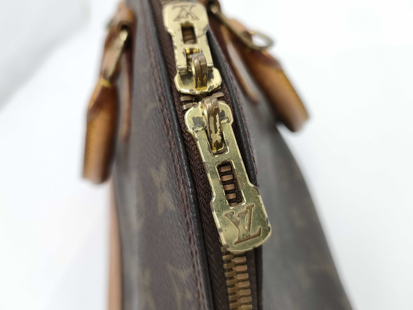 LOUIS VUITTON Monogram Alma Handbag
