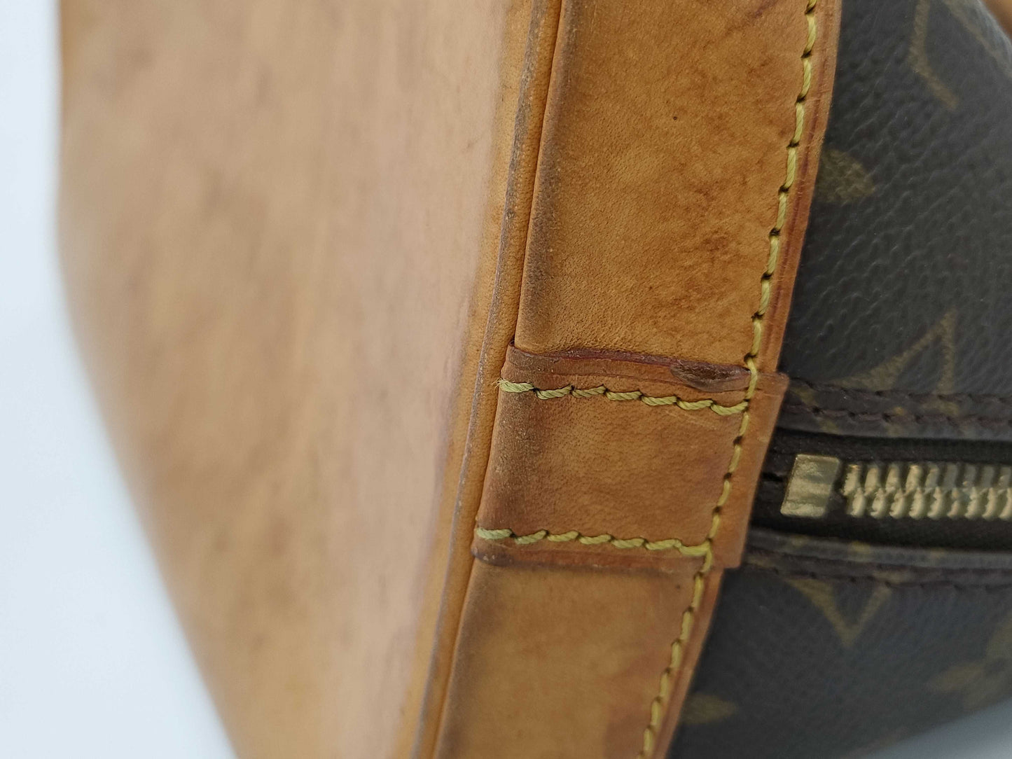 LOUIS VUITTON Monogram Alma Handbag