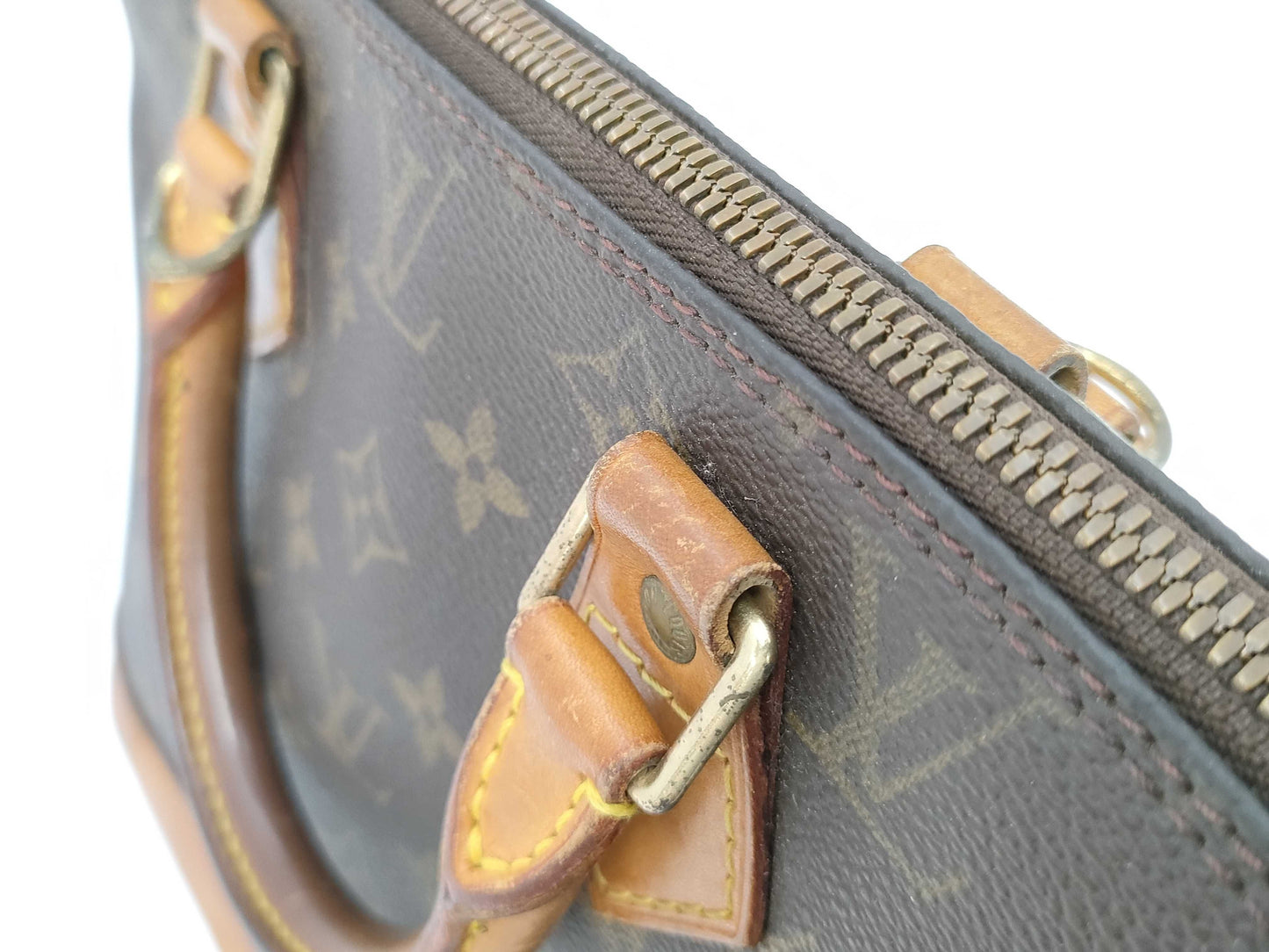 LOUIS VUITTON Monogram Alma Handbag