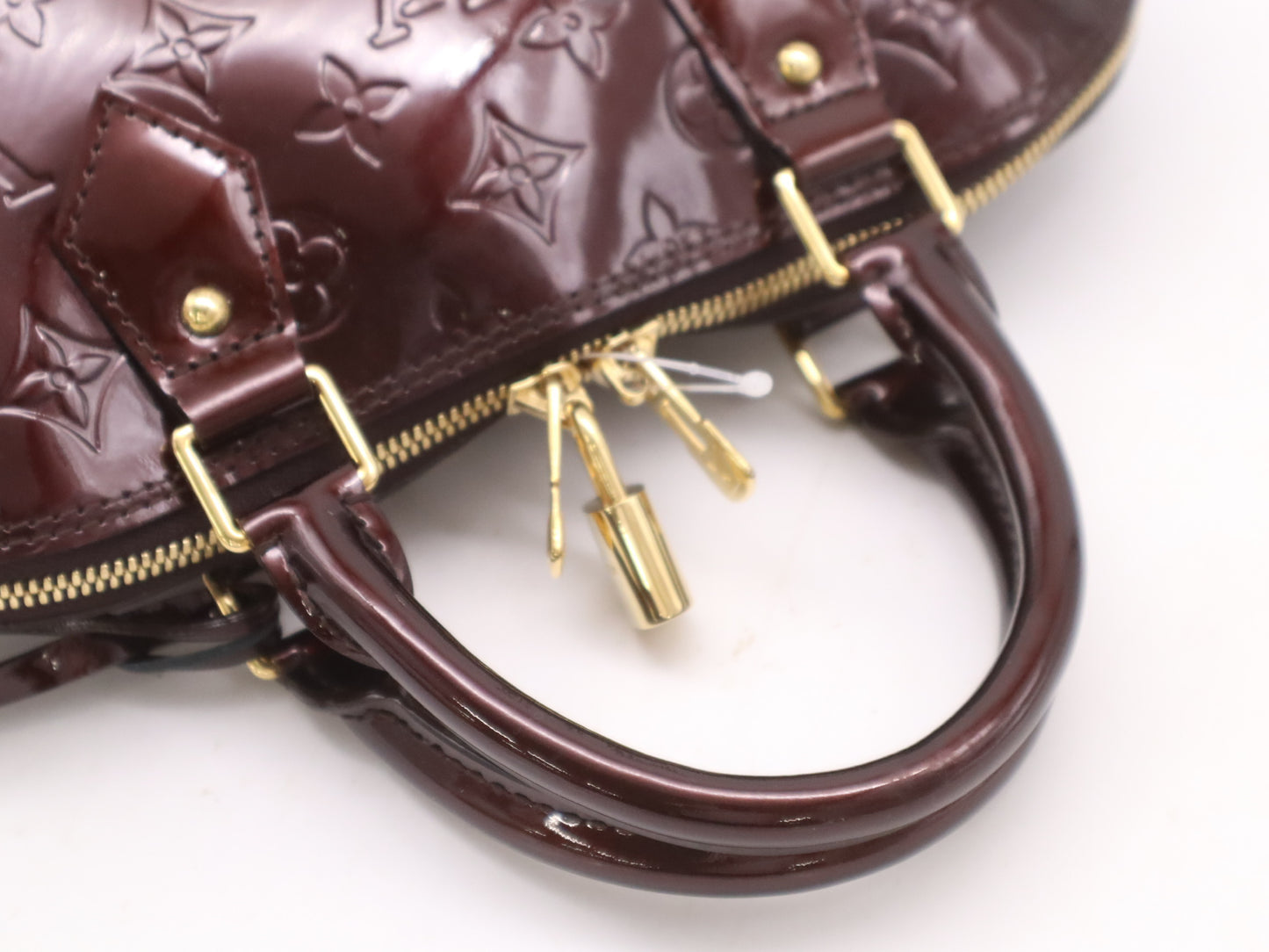 LOUIS VUITTON M91611 Vernis Alma PM Amaranth Handbag with Cadena, 2 Keys, and Cloche