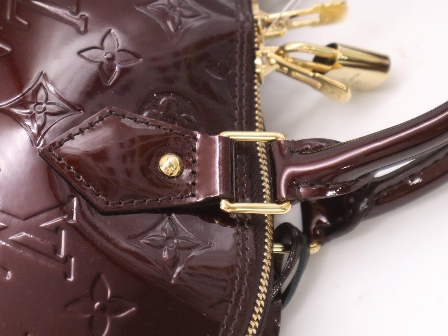 LOUIS VUITTON M91611 Vernis Alma PM Amaranth Handbag with Cadena, 2 Keys, and Cloche
