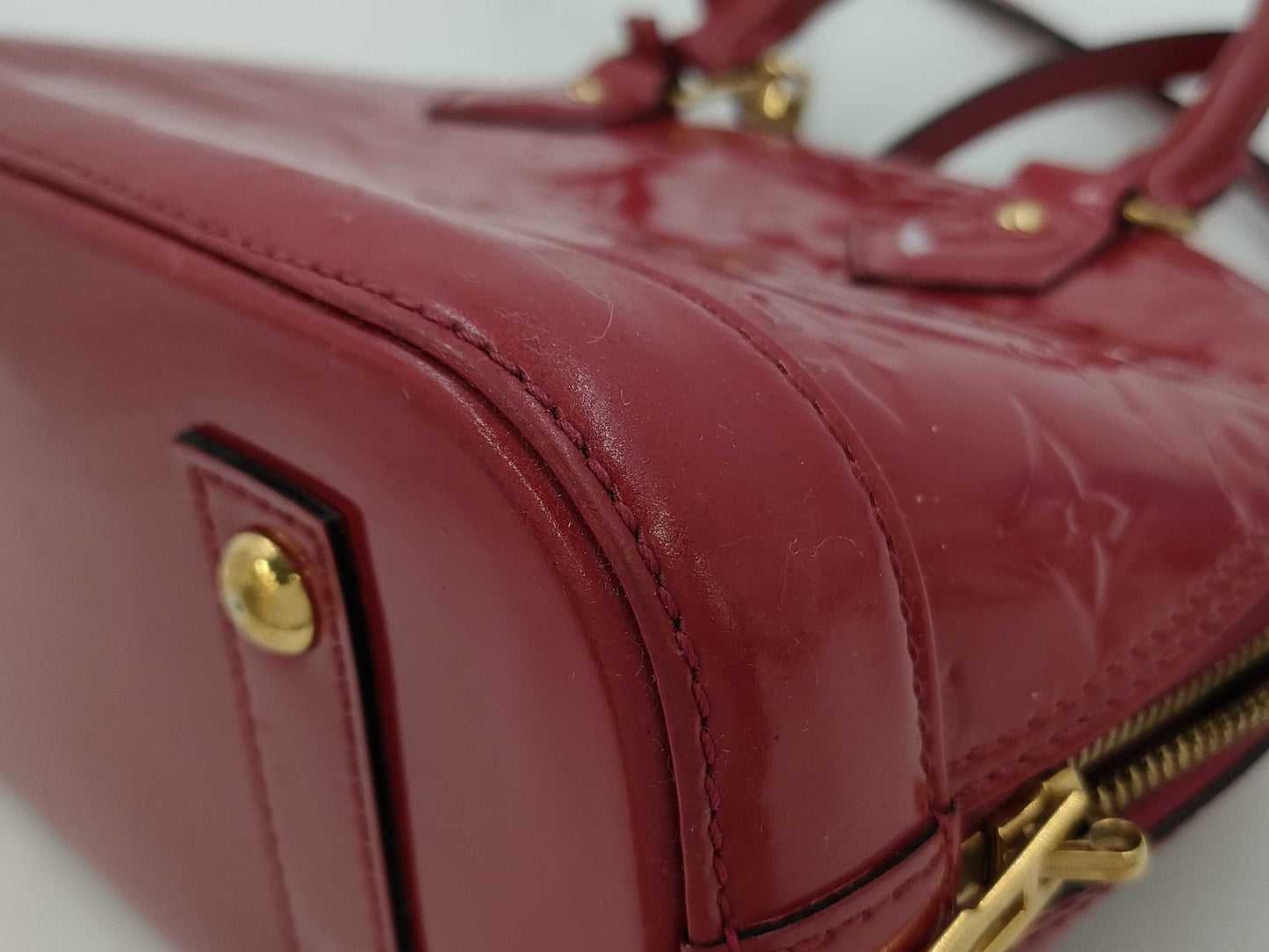 LOUIS VUITTON Vernis Alma BB Handbag