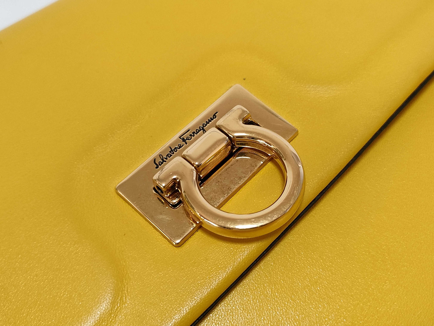 Salvatore Ferragamo Gancini ID - Salvatore Ferragamo Leather Trifolio Top Handle Yellow Handbag 25cm GHW