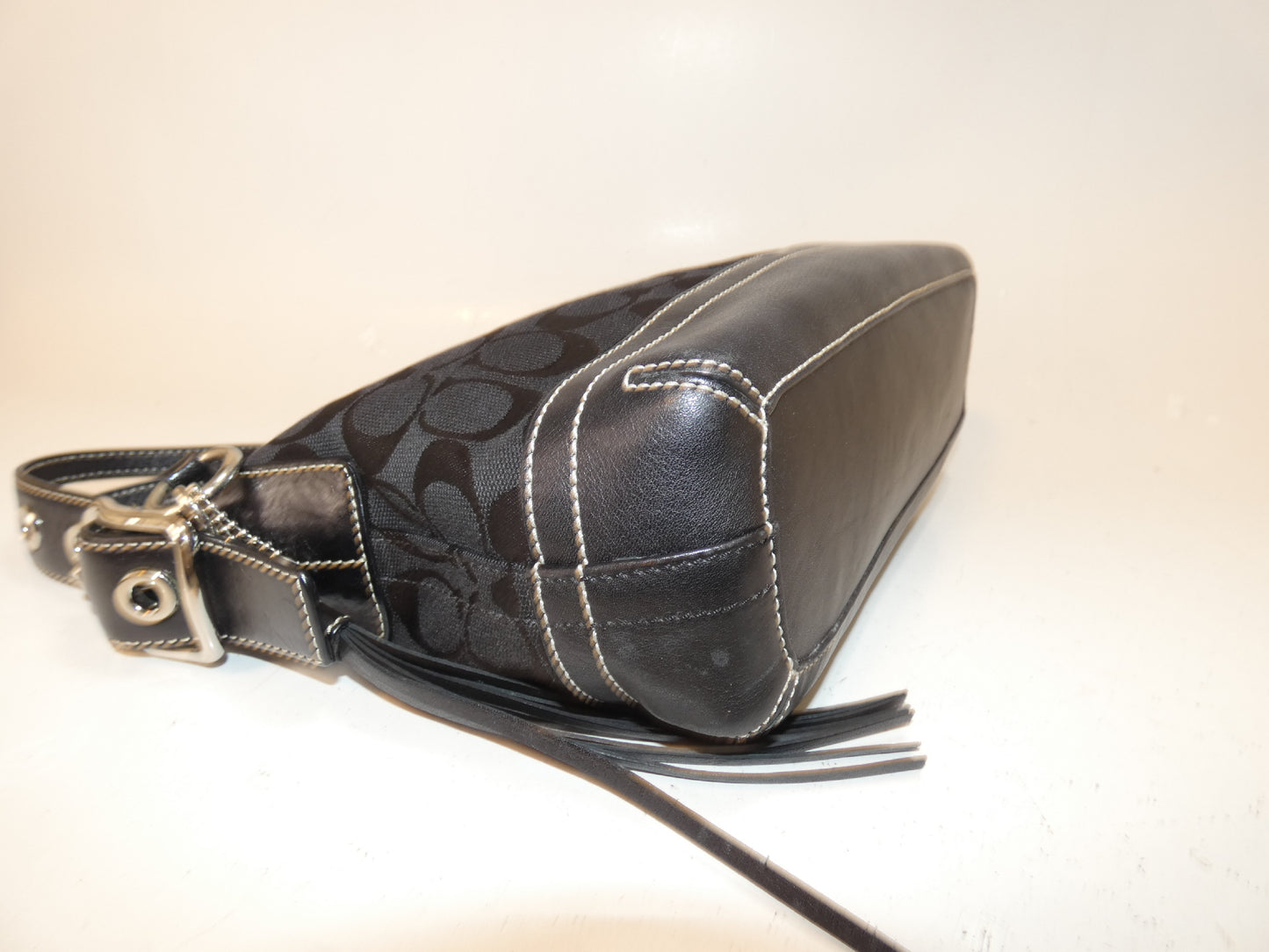 COACH Signature Canvas and Leather Black Tassel Pull One-Hand Handbag