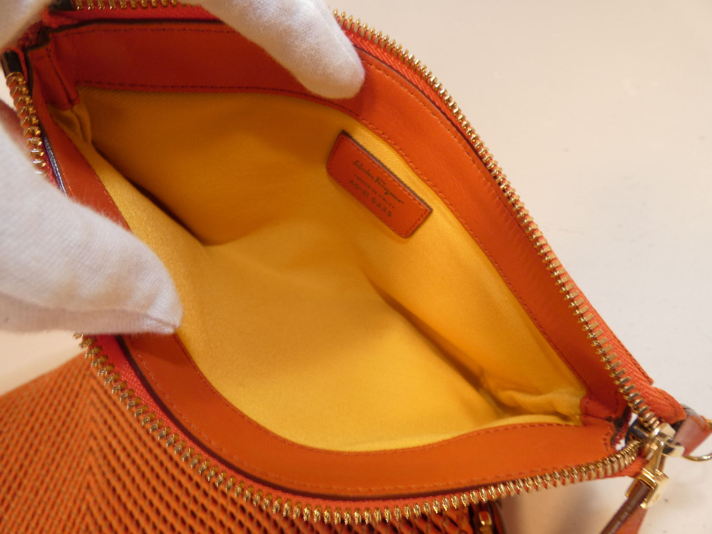 Salvatore Ferragamo Leather Braided Gancini One-Hand Shoulder Bag with Orange Pouch