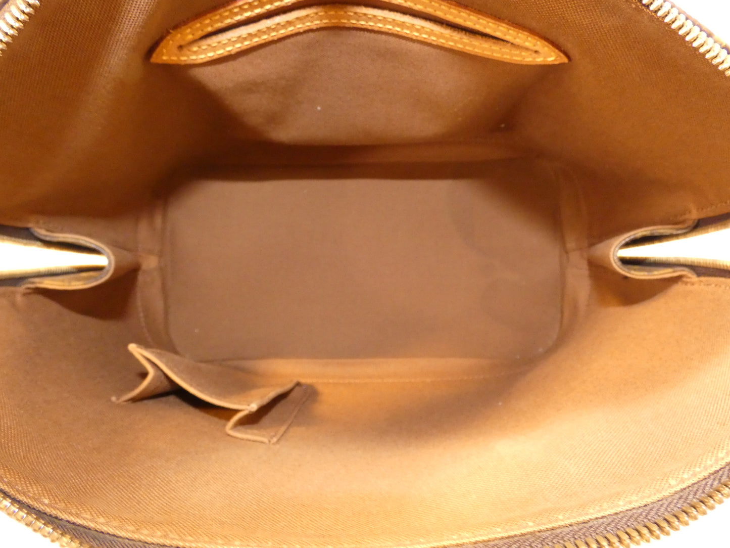 LOUIS VUITTON Alma Monogram Handbag