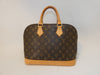 LOUIS VUITTON Alma Monogram Handbag