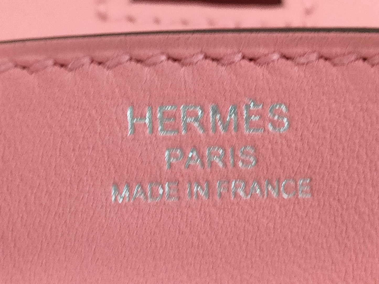 HERMES Birkin 25 in Swift leather with Rose Azalee finish and sterling silver hardware, featuring a "Y" stamp.