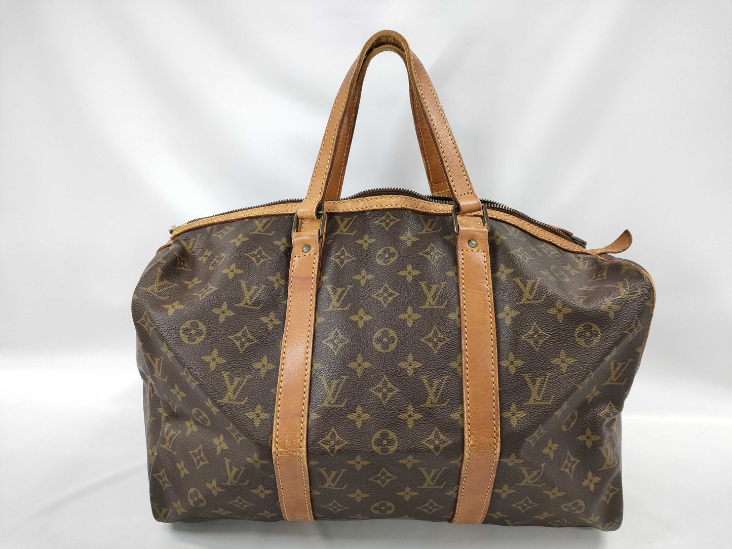 LOUIS VUITTON Monogram Sax Souple Boston Bag