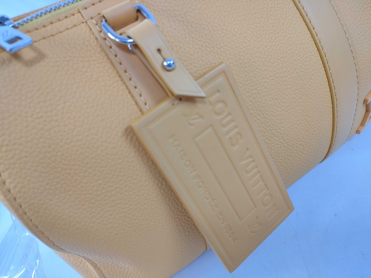LOUIS VUITTON RFID Verified, Serial Number Unverifiable, Epi Louis Vuitton City Keepall Handbag