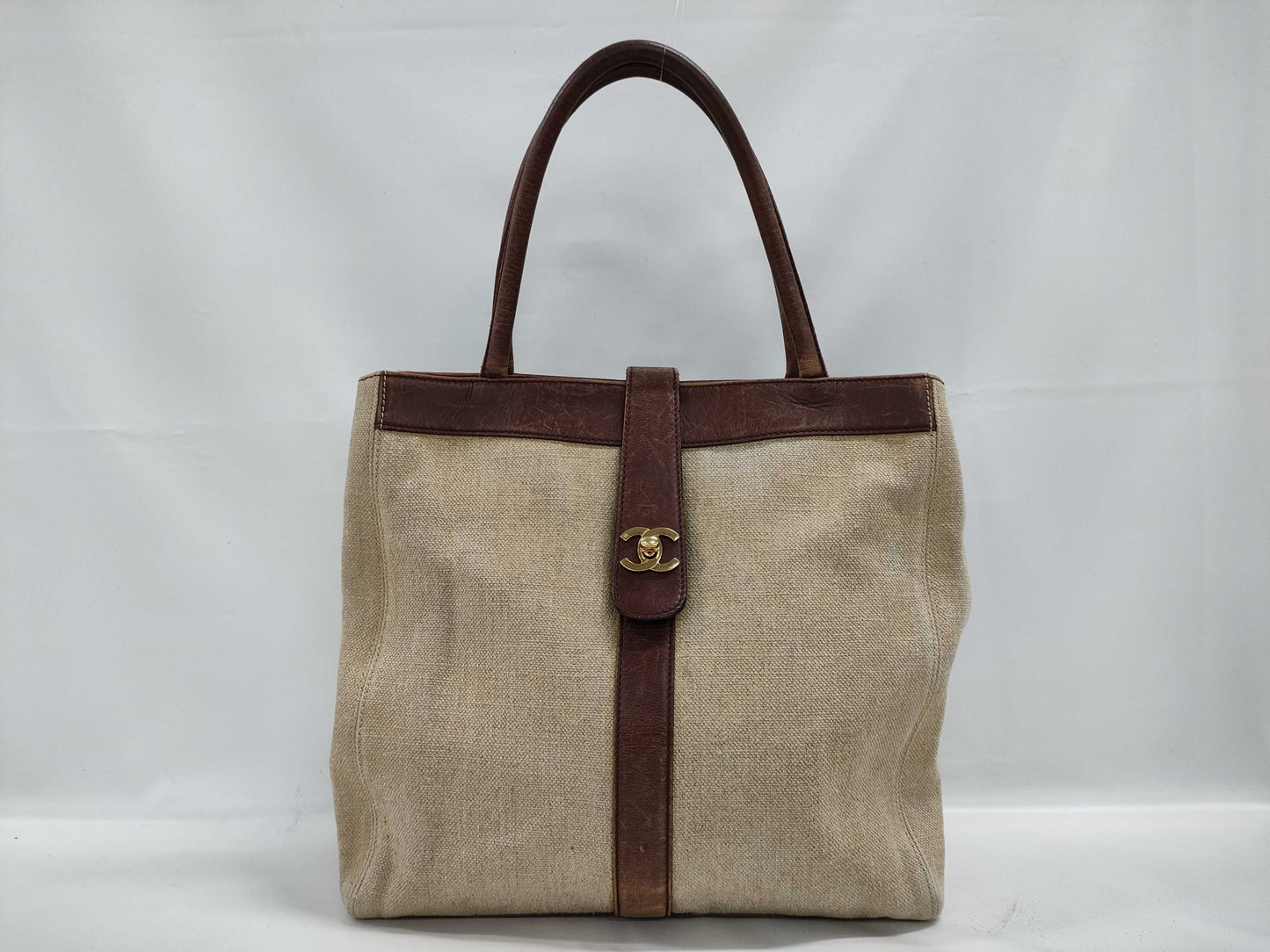 CHANEL Canvas Turnlock Brown Tote Bag