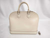LOUIS VUITTON Epi Louis Vuitton Epi Alma Handbag