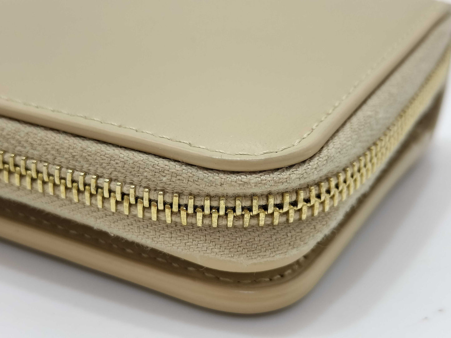 Yves Saint Laurent Paris Logo Bifold Wallet in Beige Leather