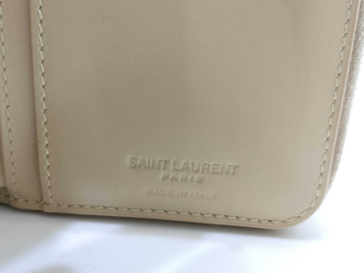 Yves Saint Laurent Paris Logo Bifold Wallet in Beige Leather