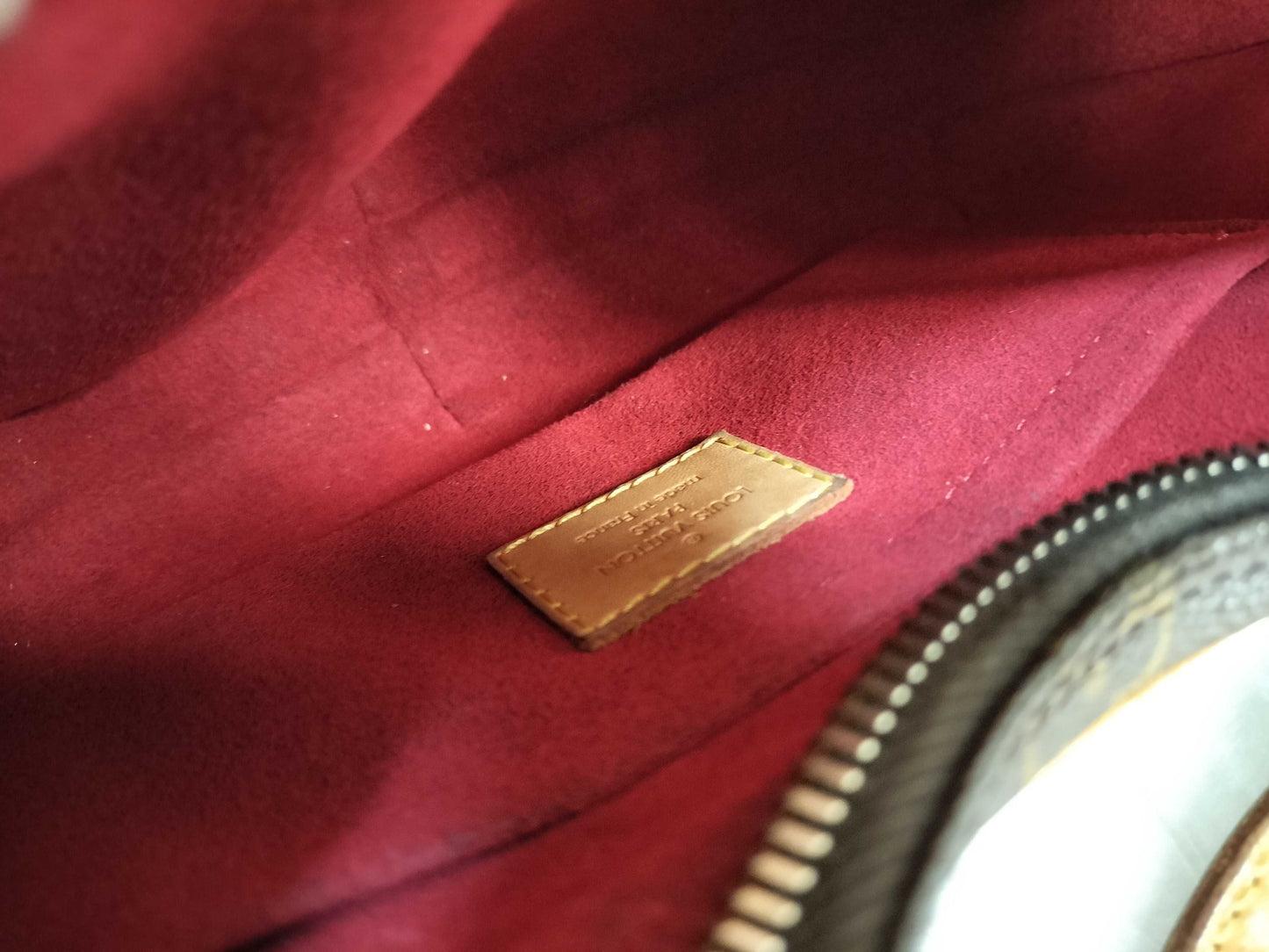 LOUIS VUITTON Unconfirmed Monogram LV Mono Pochette Croissant Handbag