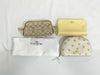 COACH 3-piece pouch set