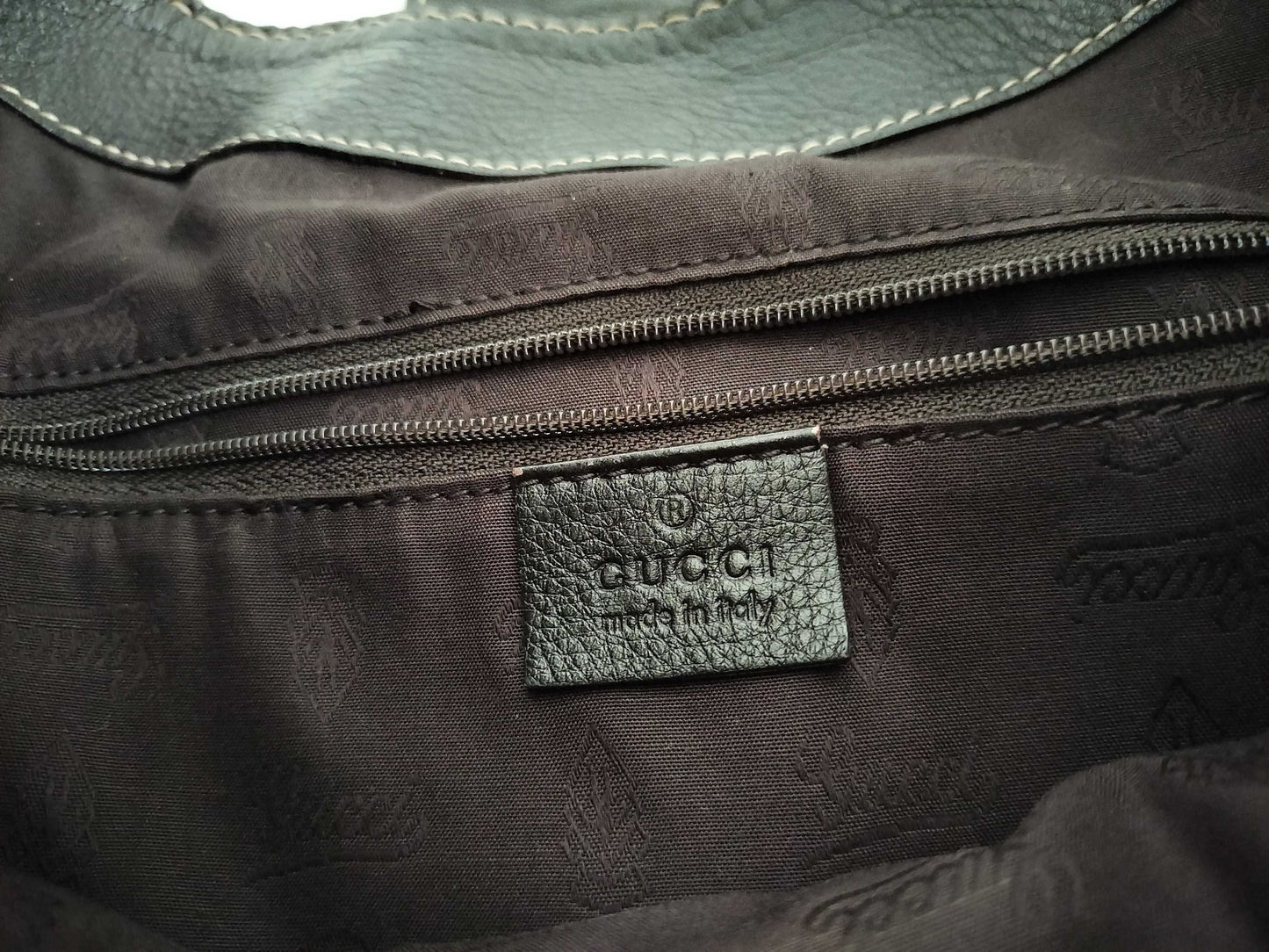 GUCCI Guccissima Leather Shoulder Bag with GG Pattern and Logo 233604