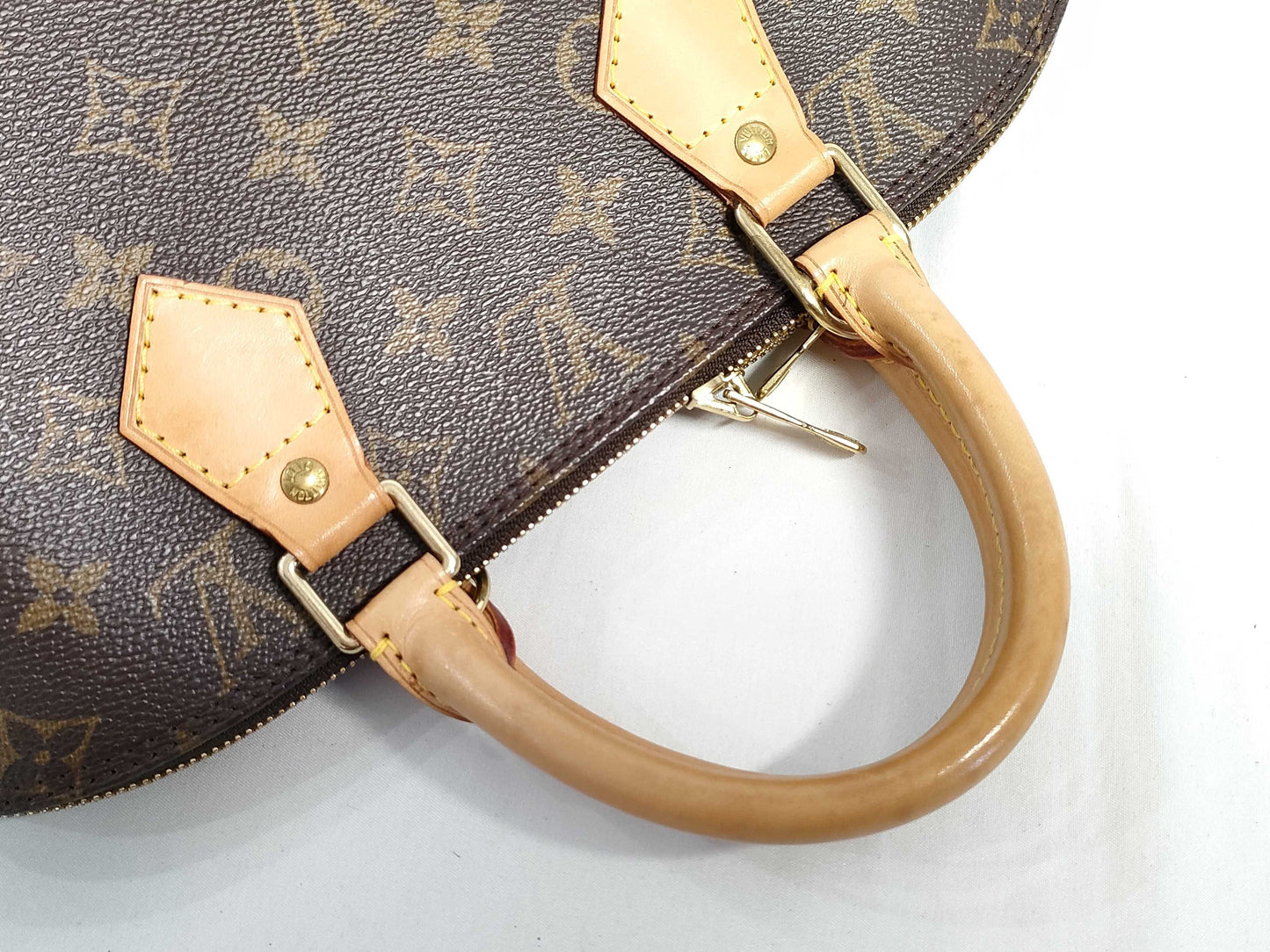 LOUIS VUITTON Monogram Alma Monogram Handbag