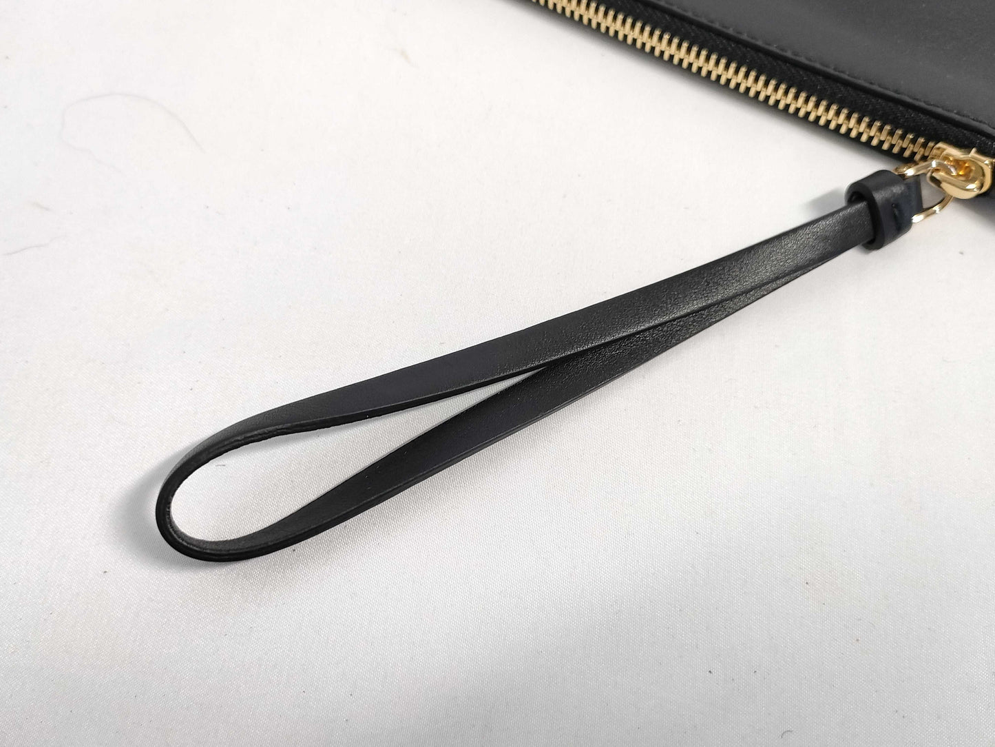 Salvatore Ferragamo black pouch with case