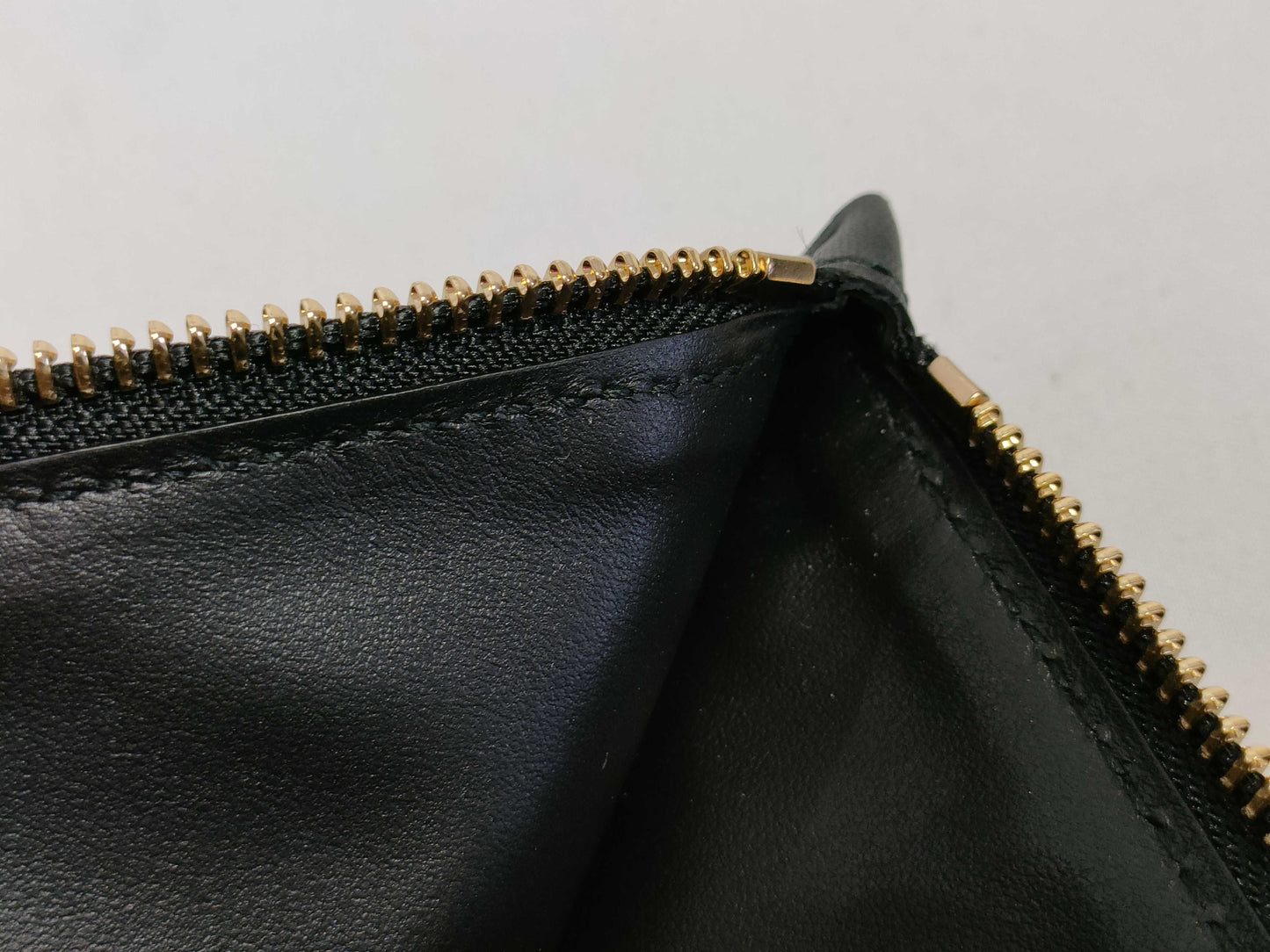 Salvatore Ferragamo black pouch with case
