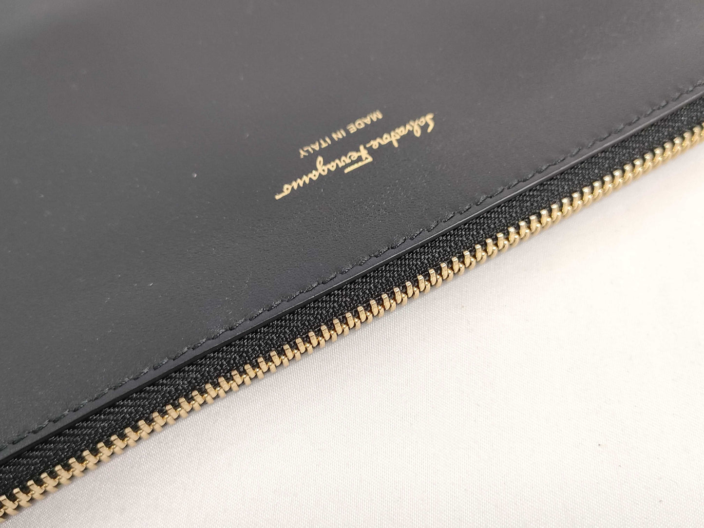 Salvatore Ferragamo black pouch with case