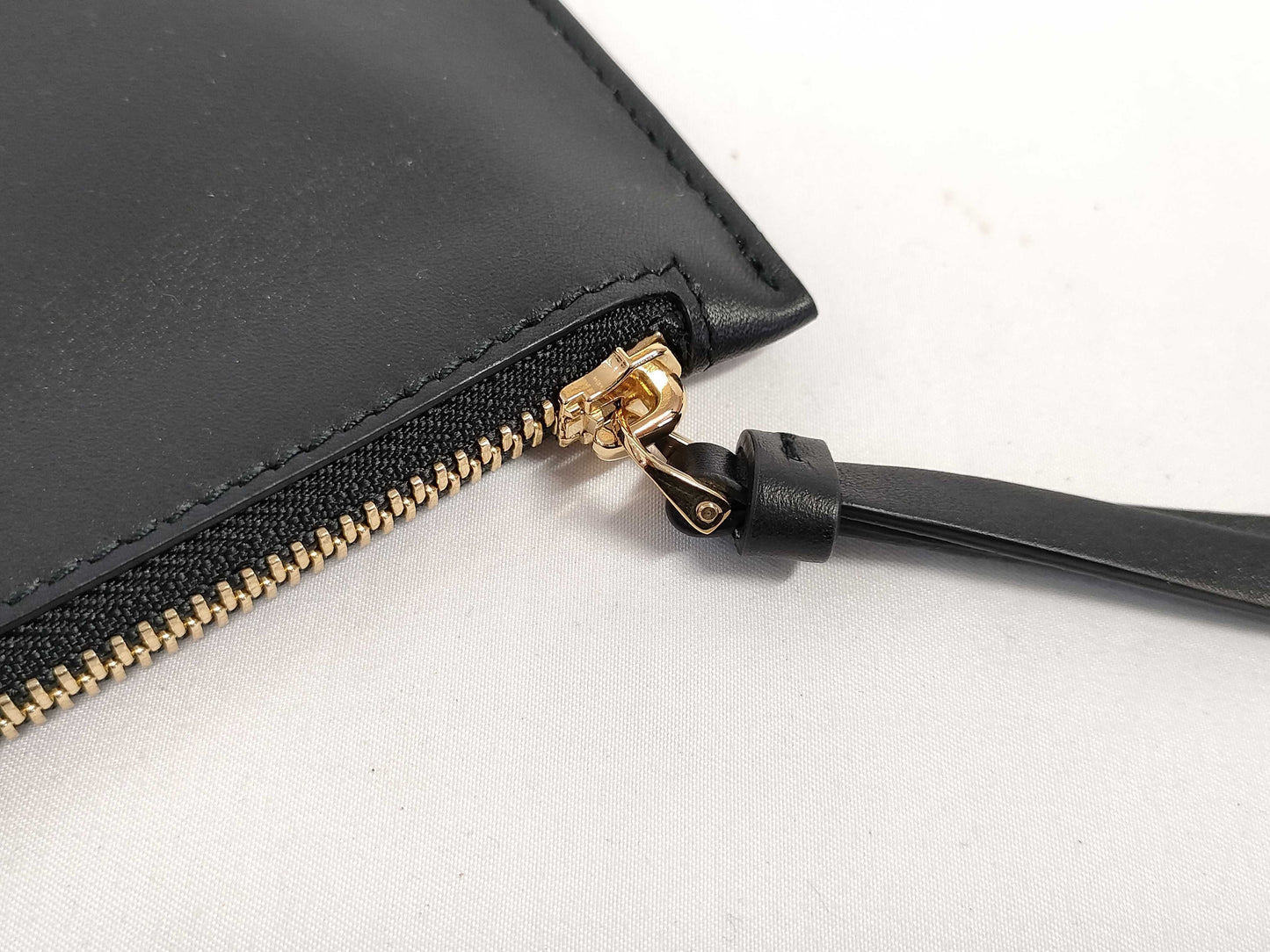 Salvatore Ferragamo black pouch with case