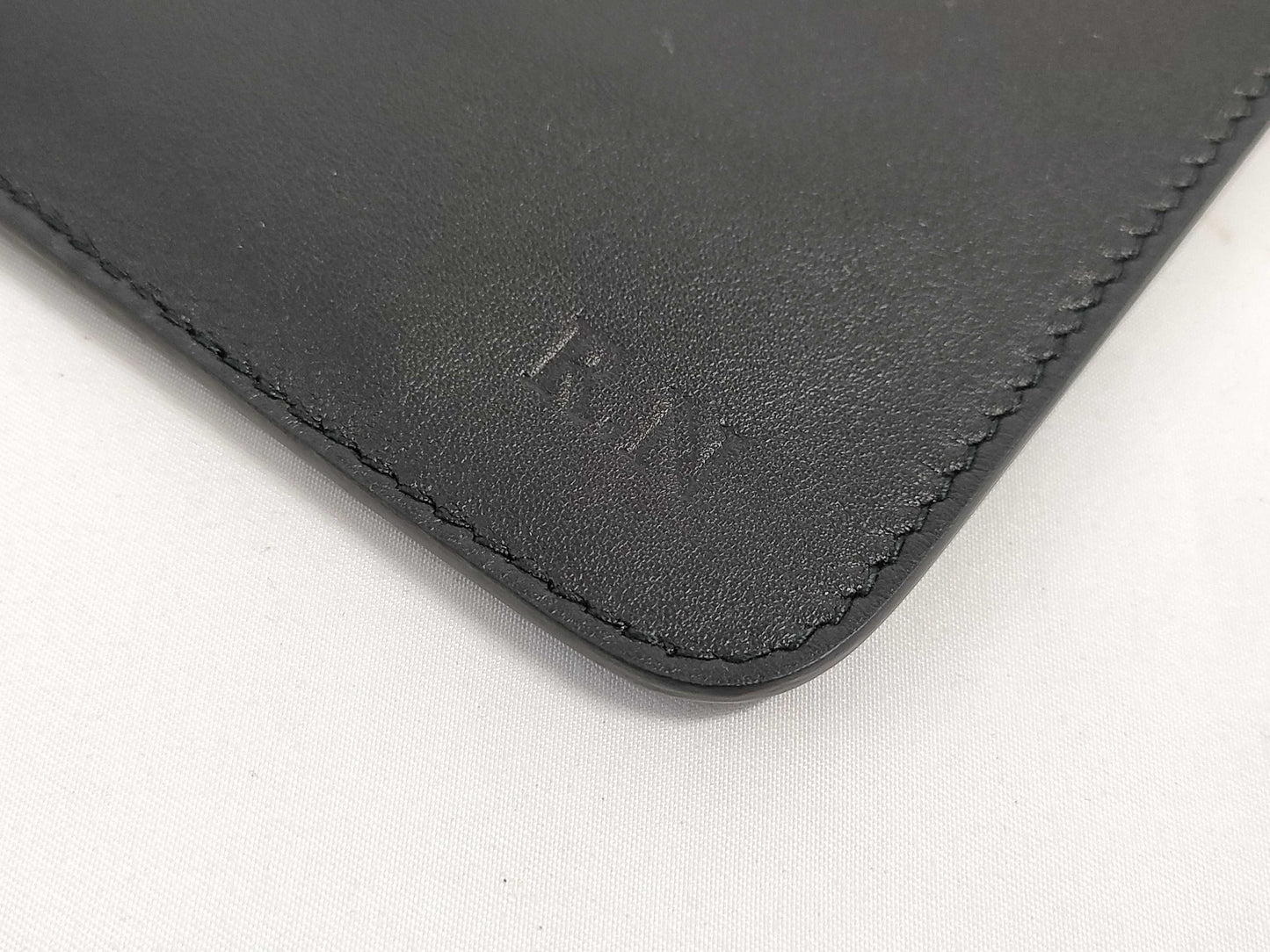 Salvatore Ferragamo black pouch with case